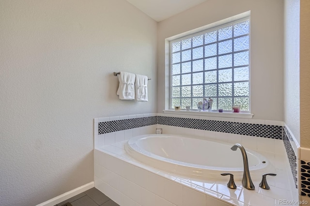 9523 Gray Ct, Westminster, CO 80031 - full bath with a garden tub and a textured wall