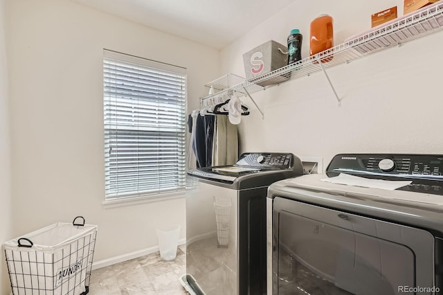 9523 Gray Ct, Westminster, CO 80031 - laundry room featuring washer and dryer and baseboards