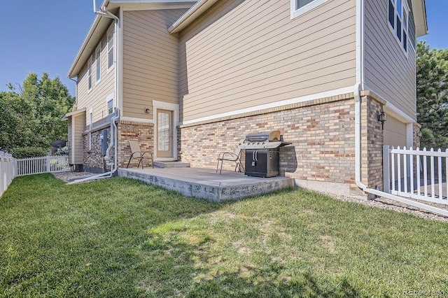 9523 Gray Ct, Westminster, CO 80031 - view of side of property with brick siding and an attached garage