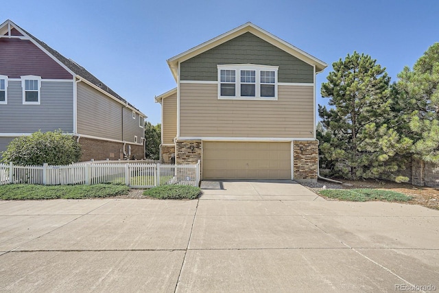 9523 Gray Ct, Westminster, CO 80031 - view of side of home featuring brick siding, a garage, and concrete driveway
