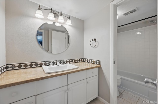 9797 E Peakview Ave Unit C10, Englewood, CO 80111 - bathroom with vanity, tile patterned floors, shower / tub combination, and toilet