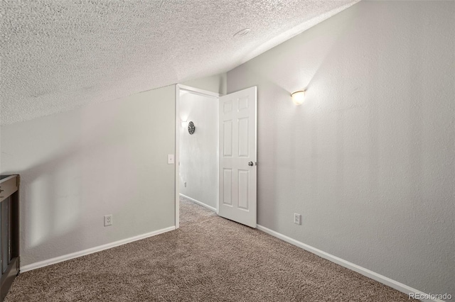 9797 E Peakview Ave Unit C10, Englewood, CO 80111 - bonus room featuring a textured ceiling, carpet flooring, and baseboards