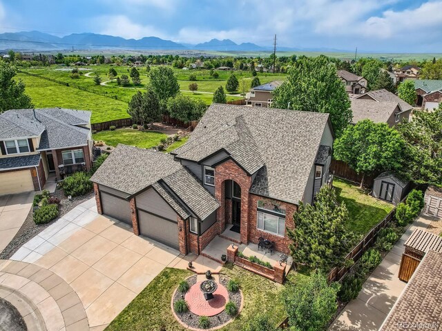 12693 W 82nd Ln, Arvada, CO 80005 - aerial view of residential area with a mountain backdrop