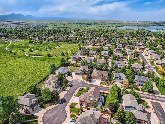 12693 W 82nd Ln, Arvada, CO 80005 - aerial overview of property's location with a nearby body of water and nearby suburban area