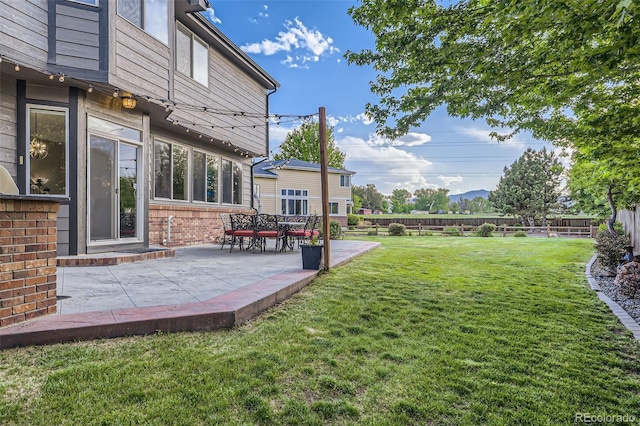 12693 W 82nd Ln, Arvada, CO 80005 - view of yard featuring a patio
