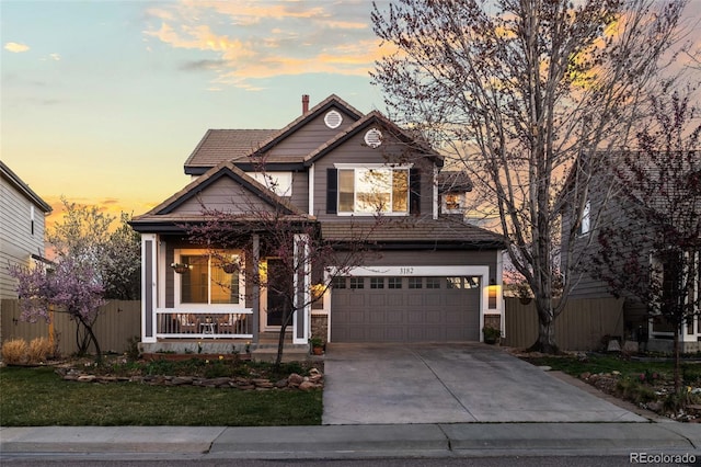 3182 Cimarron Pl, Superior, CO 80027 - craftsman inspired home featuring a tiled roof, an attached garage, a porch, fence, and driveway