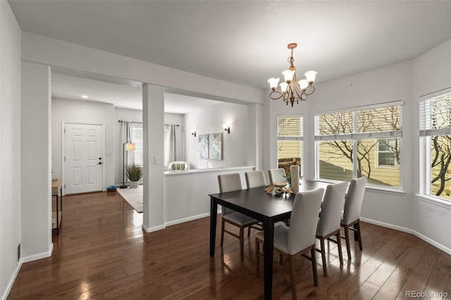 3182 Cimarron Pl, Superior, CO 80027 - dining room featuring dark wood-type flooring, a wealth of natural light, and a chandelier