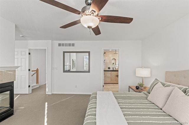 3182 Cimarron Pl, Superior, CO 80027 - carpeted bedroom with visible vents, baseboards, a ceiling fan, and ensuite bathroom