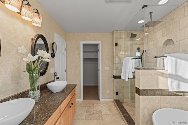 3182 Cimarron Pl, Superior, CO 80027 - full bathroom featuring a sink, a soaking tub, double vanity, and a stall shower