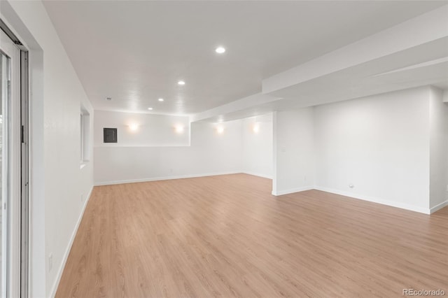 3182 Cimarron Pl, Superior, CO 80027 - finished basement featuring light wood finished floors, baseboards, and recessed lighting