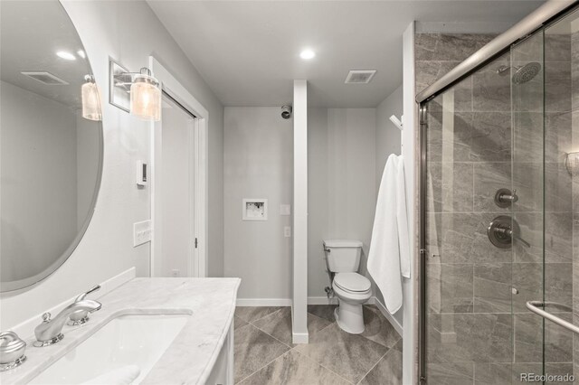 3182 Cimarron Pl, Superior, CO 80027 - full bathroom featuring vanity, tile patterned flooring, toilet, a shower stall, and visible vents