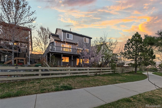 3182 Cimarron Pl, Superior, CO 80027 - view of front of home featuring a fenced front yard and a deck