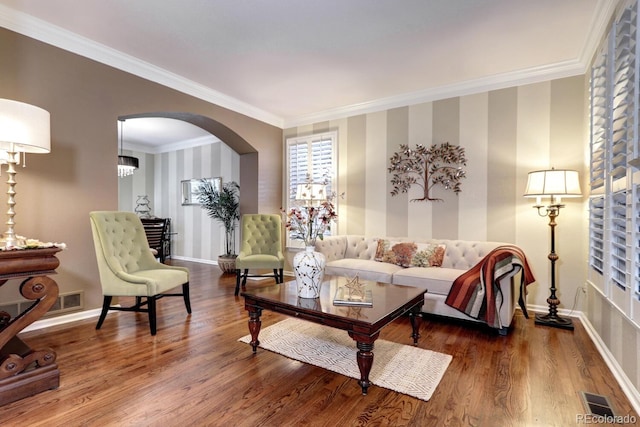 living room featuring crown molding and wood-type flooring