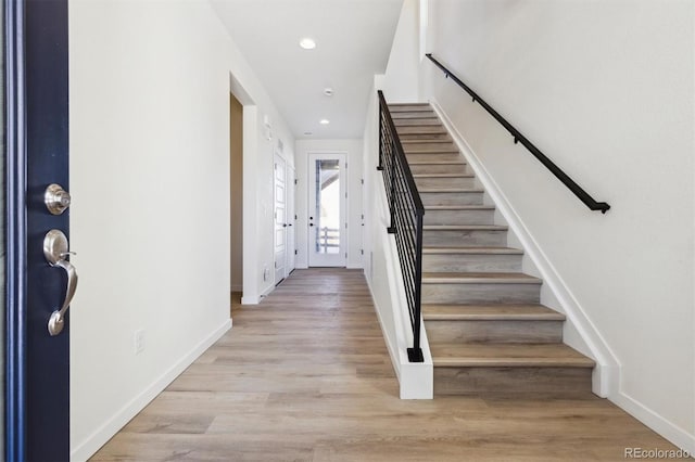 entrance foyer with light hardwood / wood-style flooring