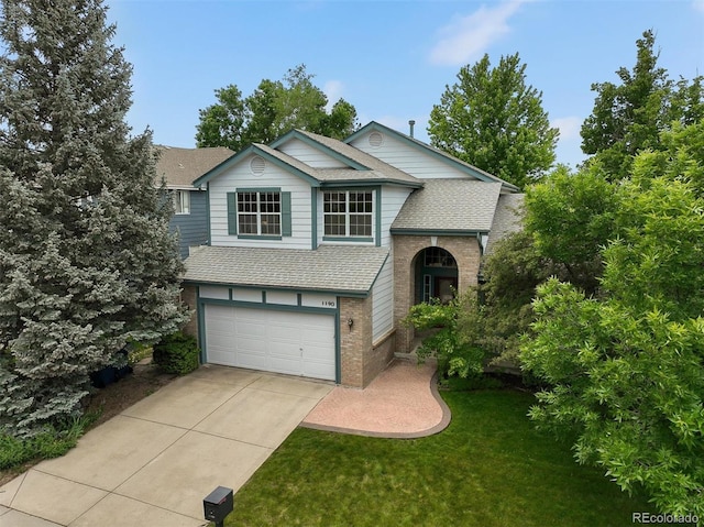 1190 W 11th Ct, Broomfield, CO 80020 - view of front of house featuring roof with shingles, an attached garage, driveway, and brick siding