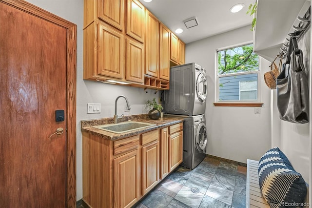 1190 W 11th Ct, Broomfield, CO 80020 - washroom with stacked washer / drying machine, cabinet space, baseboards, and recessed lighting