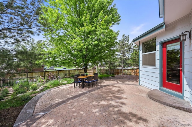 1190 W 11th Ct, Broomfield, CO 80020 - fenced backyard with a patio area and outdoor dining area