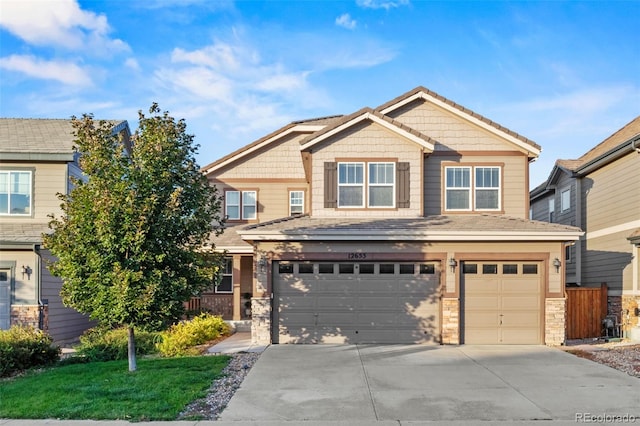 craftsman-style house with a garage