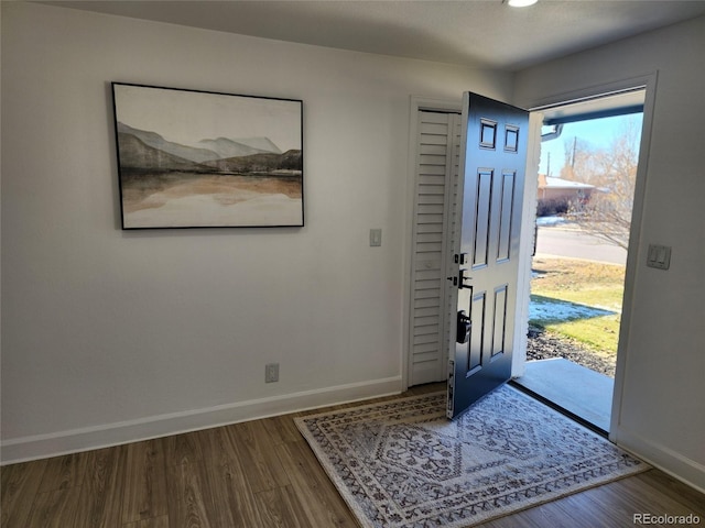 foyer entrance with hardwood / wood-style floors