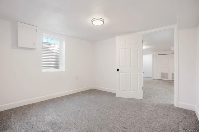 7956 Joan Dr, Denver, CO 80221 - spare room featuring light carpet and baseboards