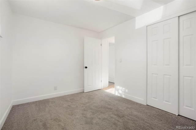 7956 Joan Dr, Denver, CO 80221 - unfurnished bedroom featuring carpet, baseboards, and a closet