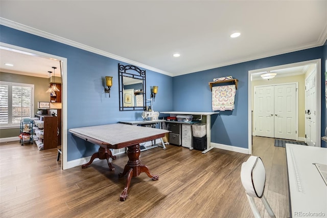 rec room featuring recessed lighting, baseboards, crown molding, and wood finished floors