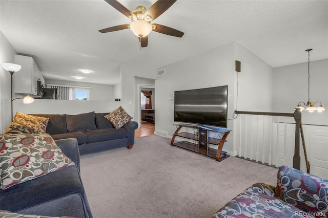 5771 W 92nd Ave Unit 328, Westminster, CO 80031 - living room with carpet floors, a ceiling fan, and a chandelier