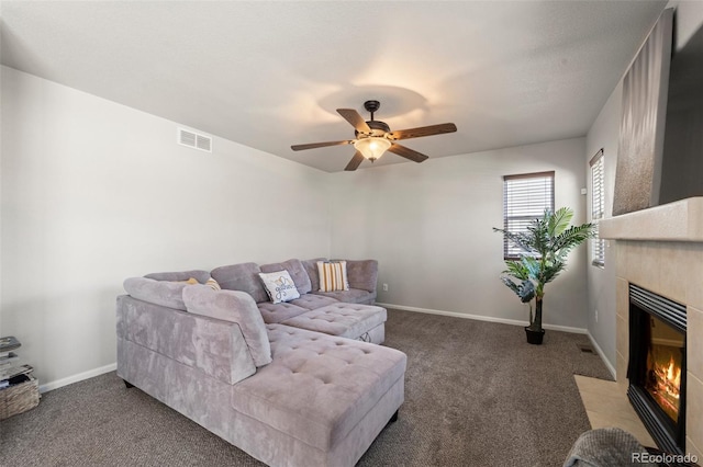 living room with carpet flooring and ceiling fan