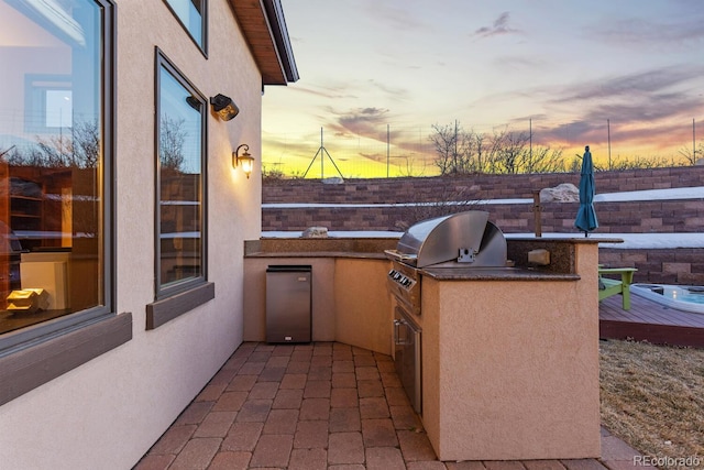 5810 Amber Ridge Dr, Castle Pines, CO 80108 - view of patio terrace at dusk