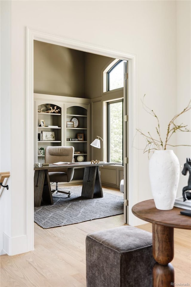 8937 Little Raven Trl, Niwot, CO 80503 - office space with wood finished floors and a high ceiling