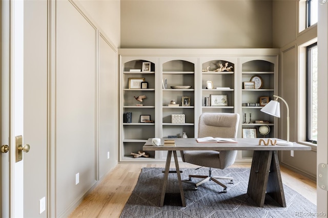8937 Little Raven Trl, Niwot, CO 80503 - home office featuring wood finished floors