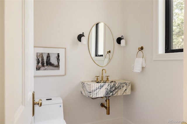 8937 Little Raven Trl, Niwot, CO 80503 - bathroom featuring toilet and baseboards