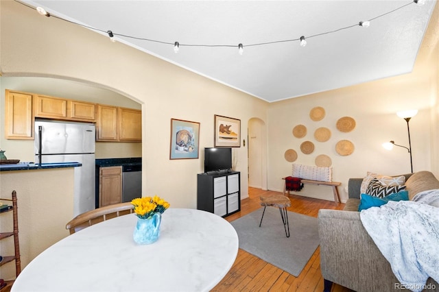 dining room with light hardwood / wood-style flooring