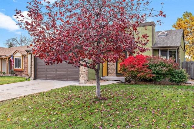 obstructed view of property featuring an attached garage, a shingled roof, concrete driveway, stone siding, and a front lawn