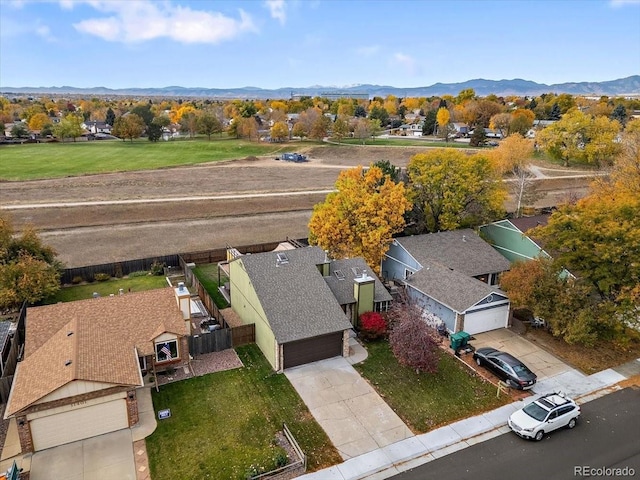 bird's eye view with a residential view and a mountain view