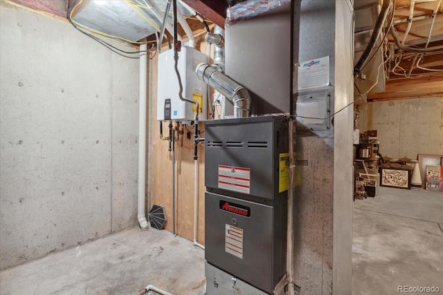 utility room featuring tankless water heater