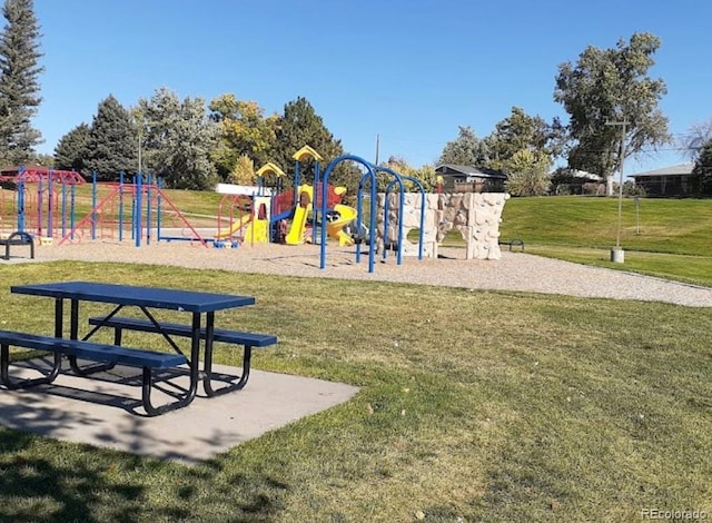 communal playground with a lawn