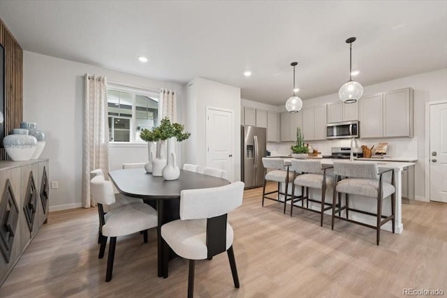 4739 N Valdai Ct, Aurora, CO 80119 - dining room featuring light wood-style floors and recessed lighting
