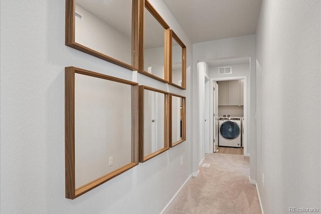 4739 N Valdai Ct, Aurora, CO 80119 - hall featuring carpet floors and separate washer and dryer