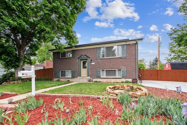 11855 Humboldt Dr, Northglenn, CO 80233 - raised ranch featuring brick siding