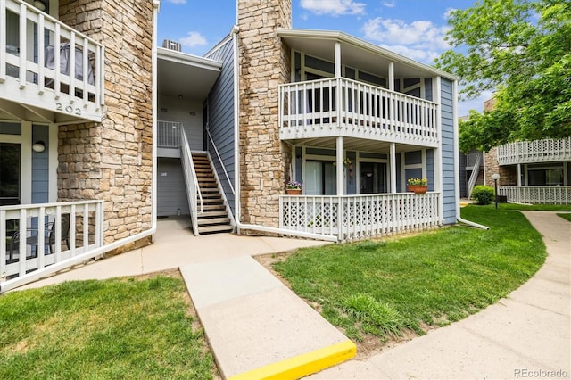 8335 Fairmount Dr Unit 9-201, Denver, CO 80247 - view of property with stairway