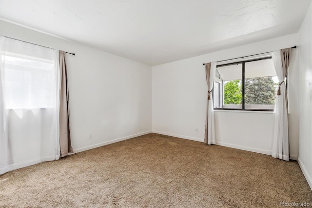 8335 Fairmount Dr Unit 9-201, Denver, CO 80247 - carpeted empty room featuring baseboards