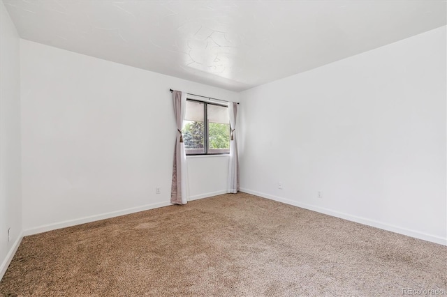 8335 Fairmount Dr Unit 9-201, Denver, CO 80247 - carpeted empty room with baseboards