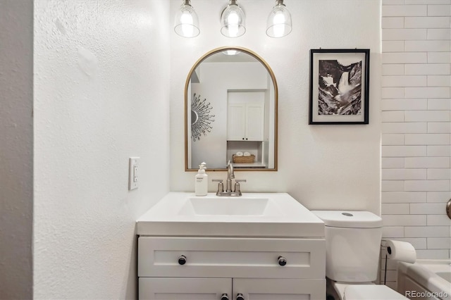 8335 Fairmount Dr Unit 9-201, Denver, CO 80247 - bathroom with vanity, toilet, and shower / bath combination