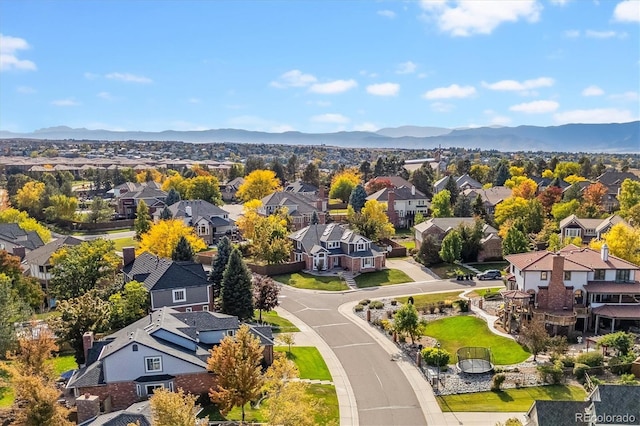 drone / aerial view with a residential view and a mountain view