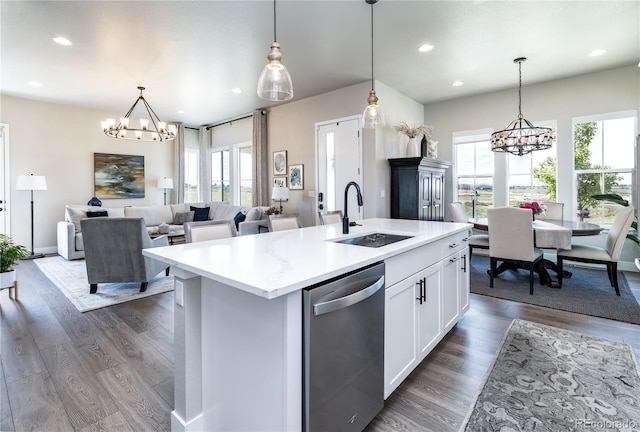 6235 Stable View St, Castle Pines, CO 80108 - kitchen with a chandelier, dishwasher, plenty of natural light, light countertops, and recessed lighting