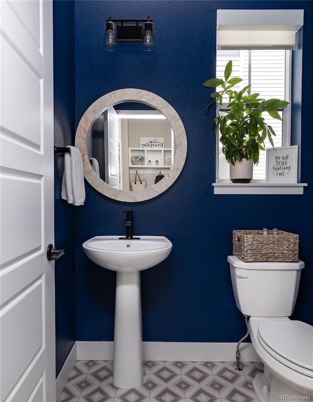 6235 Stable View St, Castle Pines, CO 80108 - bathroom with tile patterned floors and toilet