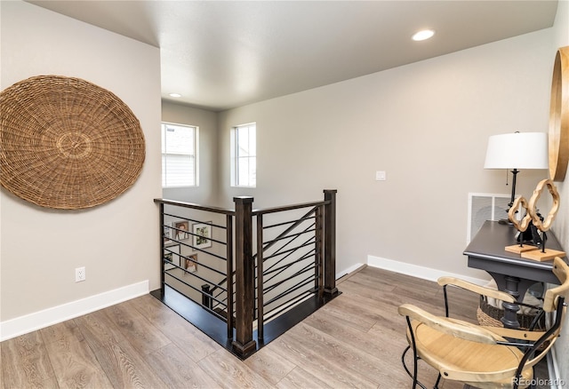 6235 Stable View St, Castle Pines, CO 80108 - stairway featuring wood finished floors and recessed lighting