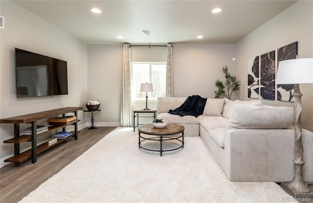 6235 Stable View St, Castle Pines, CO 80108 - living room with wood finished floors and recessed lighting