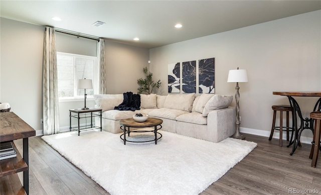 6235 Stable View St, Castle Pines, CO 80108 - living room featuring wood finished floors and recessed lighting